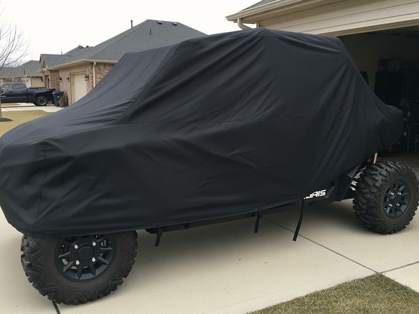 AllGuard black cover fitted on UTV in driveway